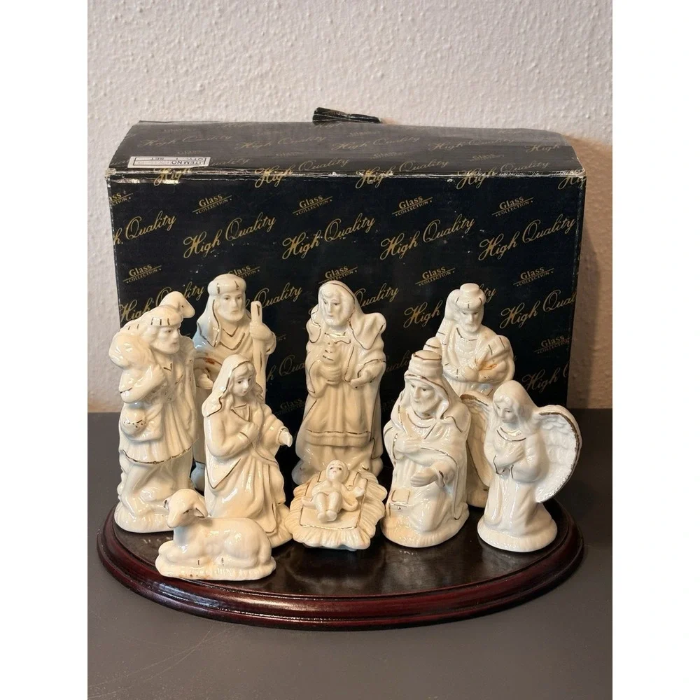 Collectible 9 pc. porcelain Nativity Set with With Wood Base